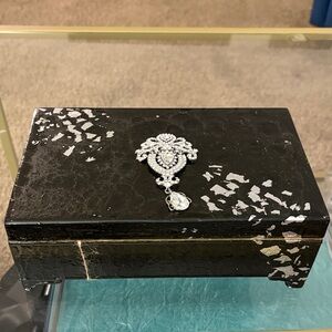 Elegant Black Jewelry Box with Silver Accents